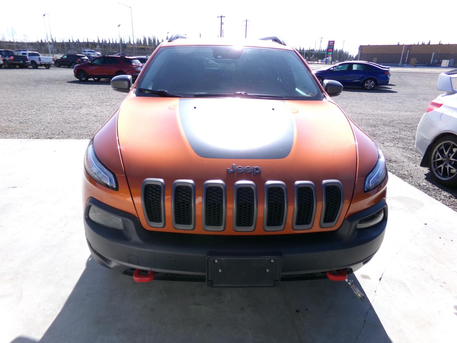 2015 orange Jeep Cherokee Trailhawk (1C4PJMBS1FW) with an 3.2L V6 DOHC 24V engine, 9-Speed Automatic transmission, located at 2630 Philips Field Rd., Fairbanks, AK, 99709, (907) 458-0593, 64.848068, -147.780609 - Photo #1